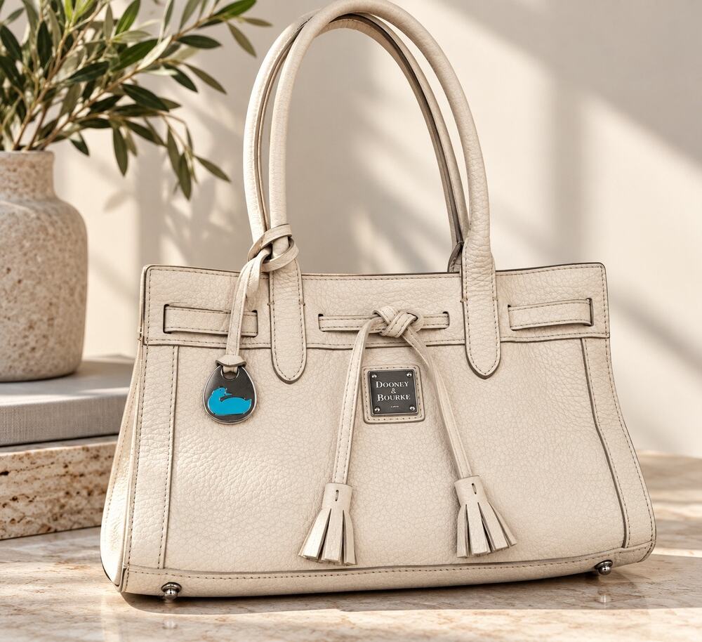 Dooney & Bourke Y2K Cream Pebble Leather East West Tassel Tote Bag